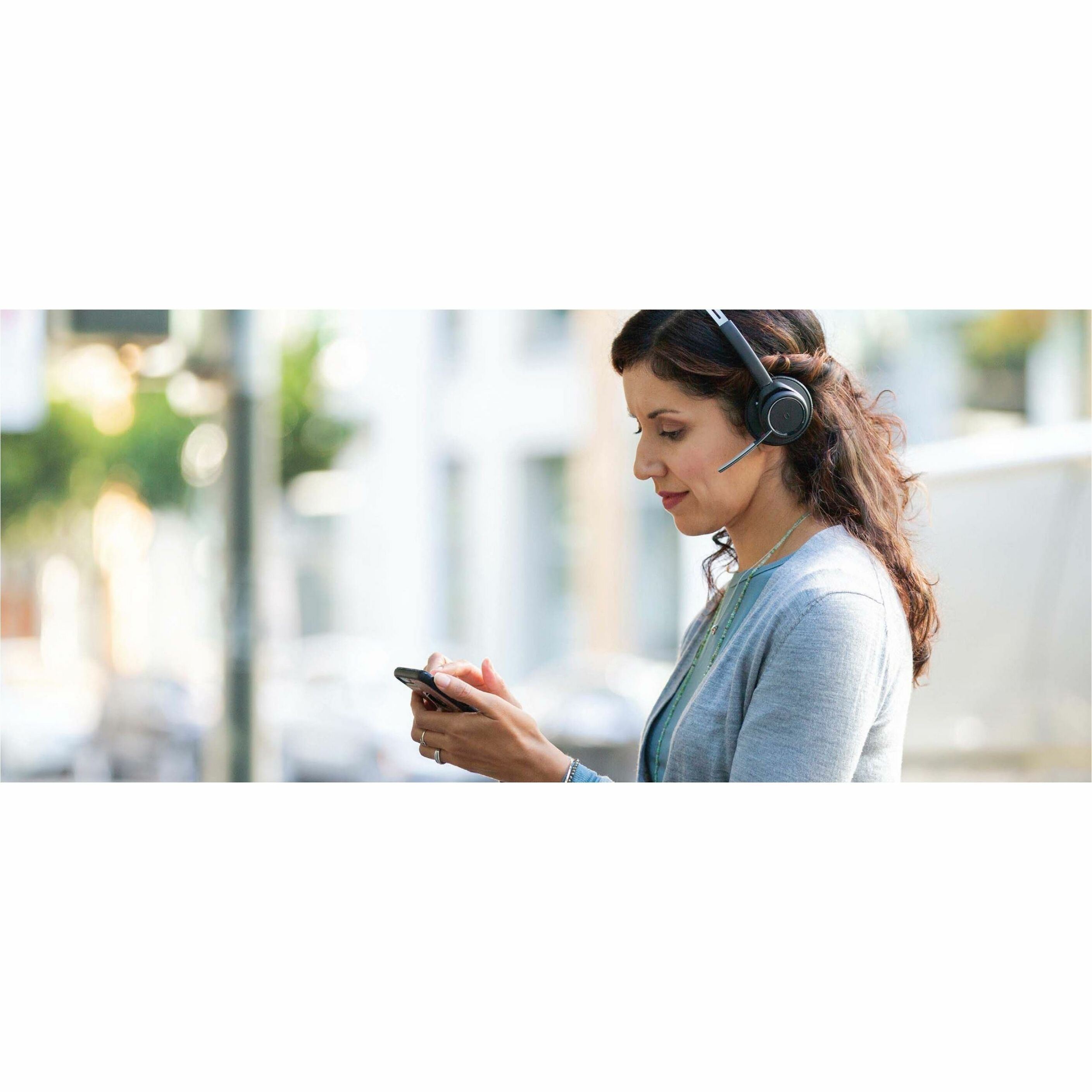 Poly Voyager Focus B825 UC USB-C Headset +Charging Stand TAA - Microsoft Teams Certification - Siri, Google Assistant - Stereo - Wireless - Bluetooth - 98.4 ft - 20 Hz to 20 kHz - On-ear - Binaural - MEMS Technology, Electret Condenser, Noise Cancelling Microphone - Noise Canceling - Black - TAA Compliant — life style